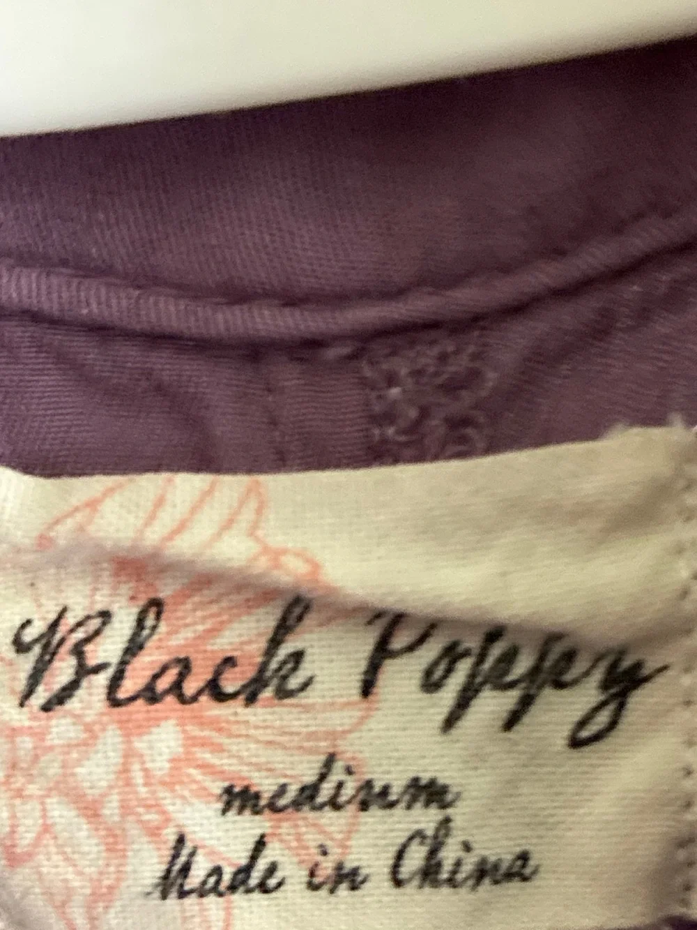 Black Poppy Mauve Cutout Mini Skirt